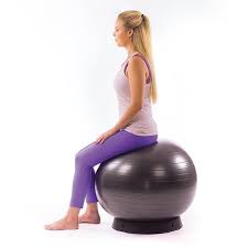 Woman sitting on a stability ball